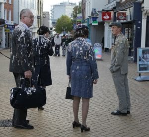 people covered in bird droppings