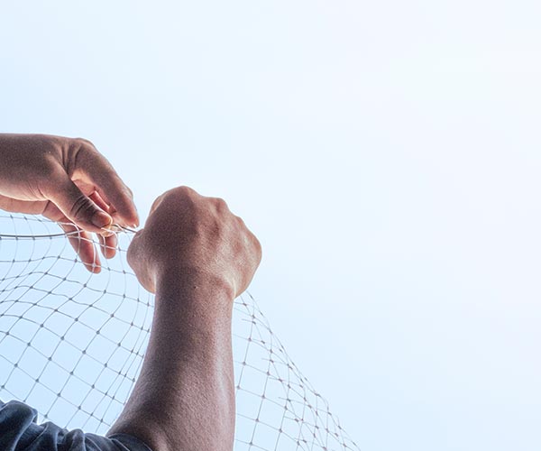 Bird netting installed on Calgary condo balcony