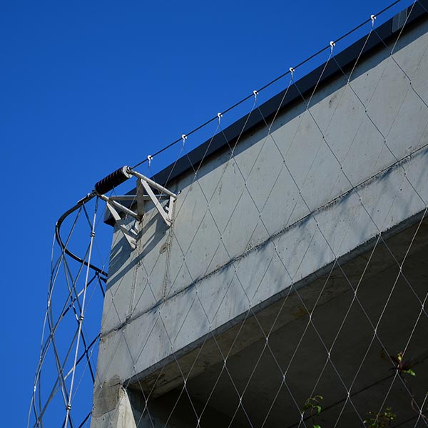 Bird netting protecting a commercial loading dock from nesting birds