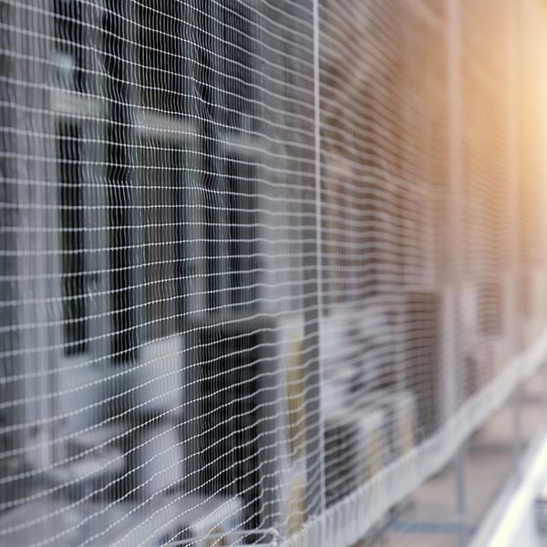 Bird netting installed above an industrial loading dock